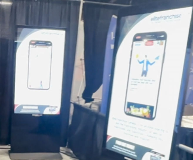 Our digital signage wasn't just about information — it provided dynamic visuals, highlighted sponsor messages, displayed the event schedule, and showcased the Elite Franchise Magazine's awards program, creating an immersive environment for attendees.